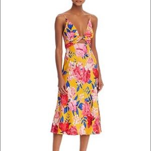 Vibrant floral dress perfect for tropical wedding. Great condition